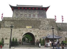 AT